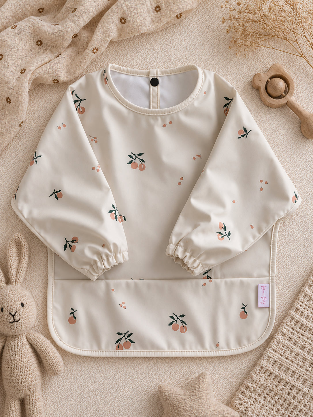 Slabbetje met Mouwen sinasappel print – Waterdicht & Eco-vriendelijk | Kraamcadeau